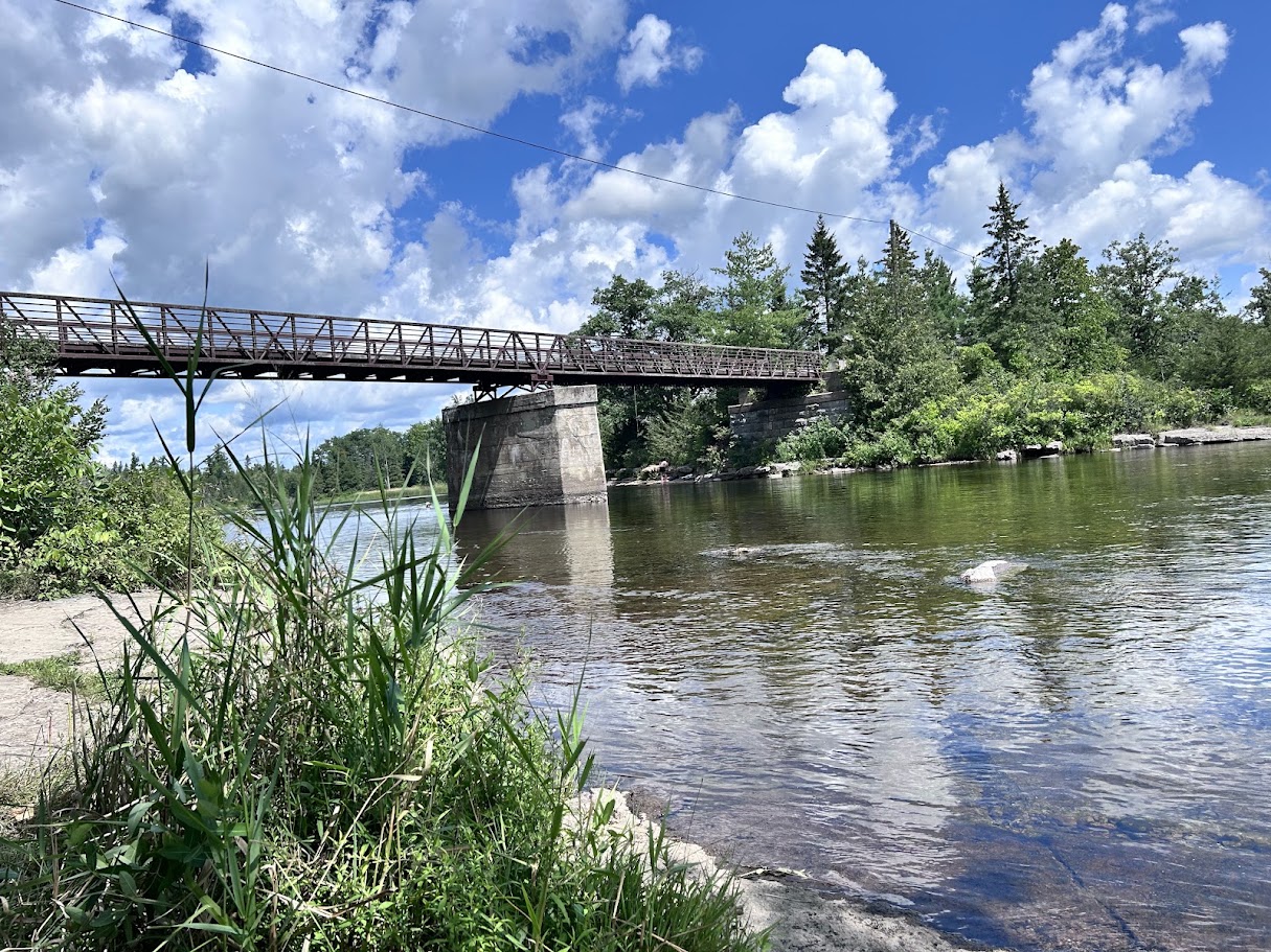 A steel truss bridge over a river at Callaghan's Rapids Conservation Area, a good lunch stop along the trail