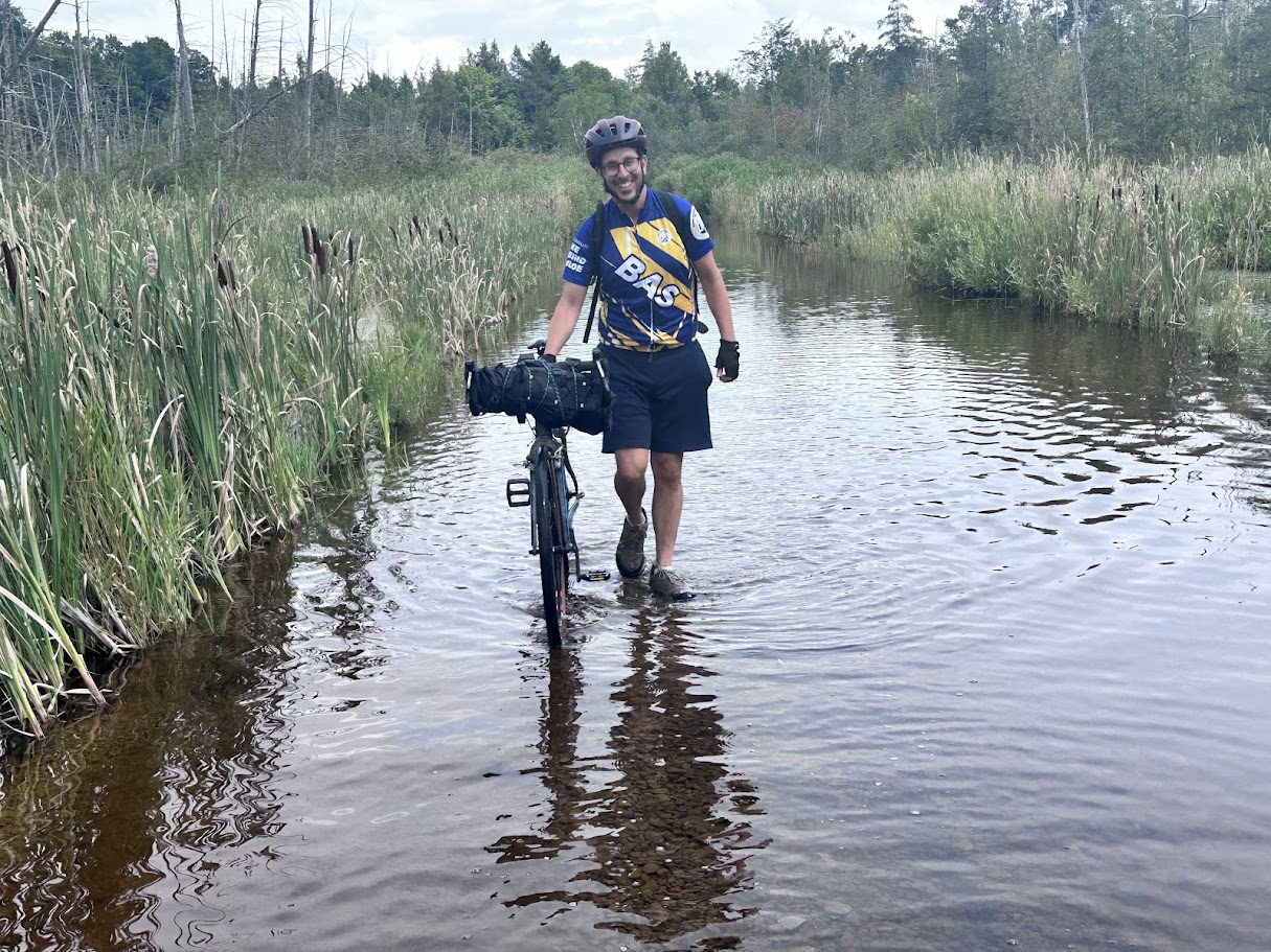 Wading a flooded section of the Hastings Heritage Trail after a stretch of rain